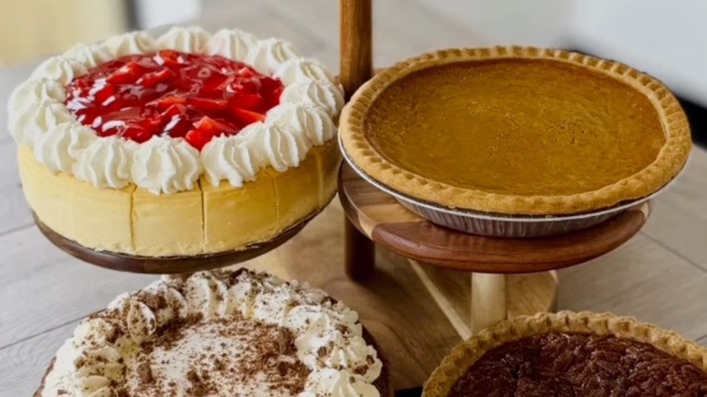 Assorted pies and cakes from Luby's on multi-tiered stand.