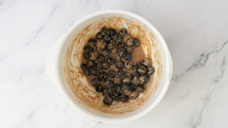 Floury, spiced blueberry mixture in bowl