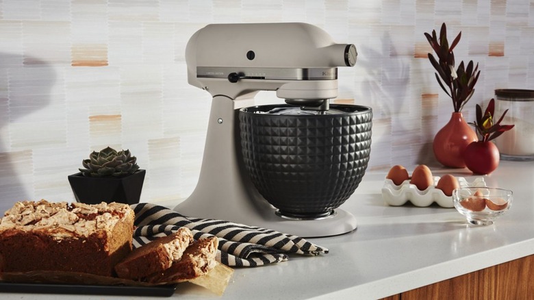 The new KitchenAid stand mixer with a matte black geometric design mixing bowl