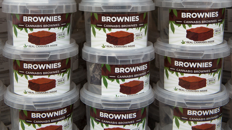 stacked containers of weed brownies