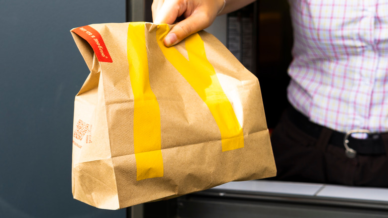 Person holding McDonald's bag