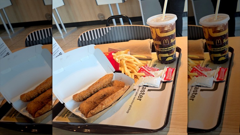 McDonald's McCrispy strips on tray with fries and a drink