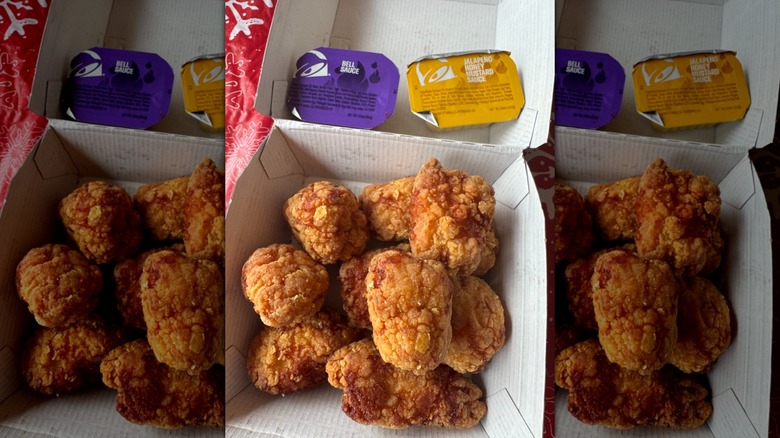 Box of Taco Bell chicken nuggets with dipping sauces