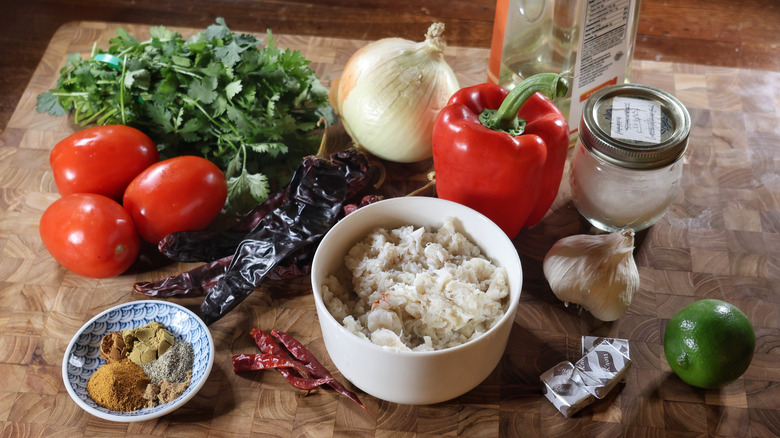 chilpachole de jaiba ingredients laid out on cutting board