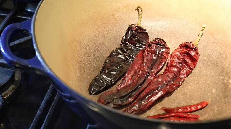 large pot with several dried chiles in it