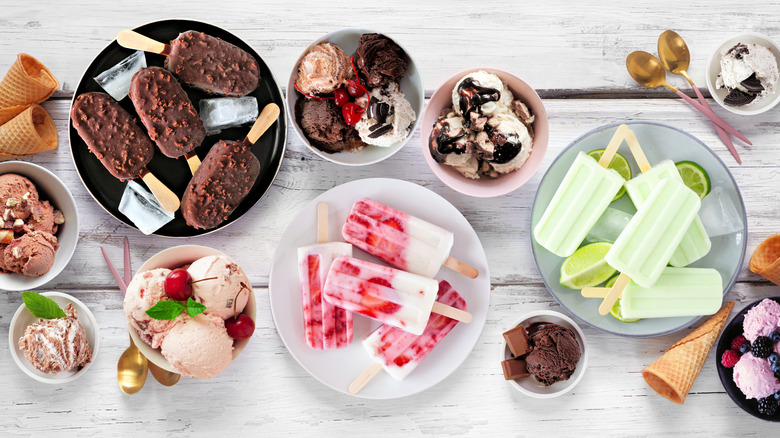 Selection of frozen treats on a rustic white table