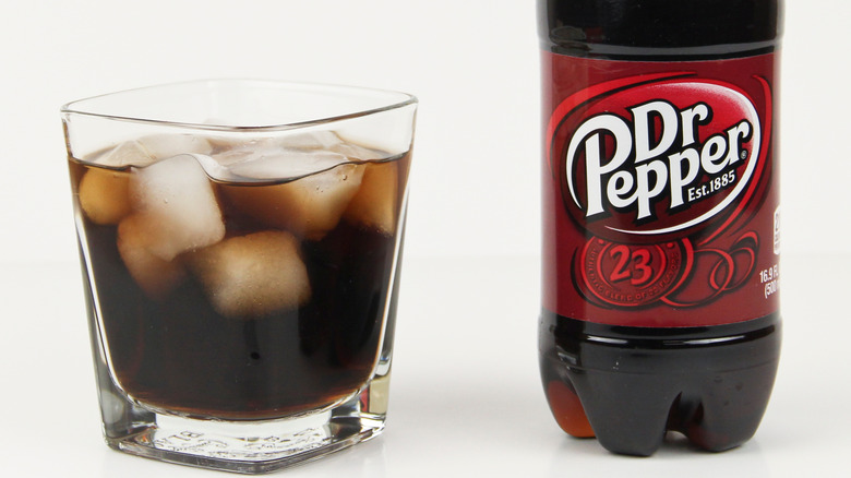 Dr Pepper soda in bottle and glass
