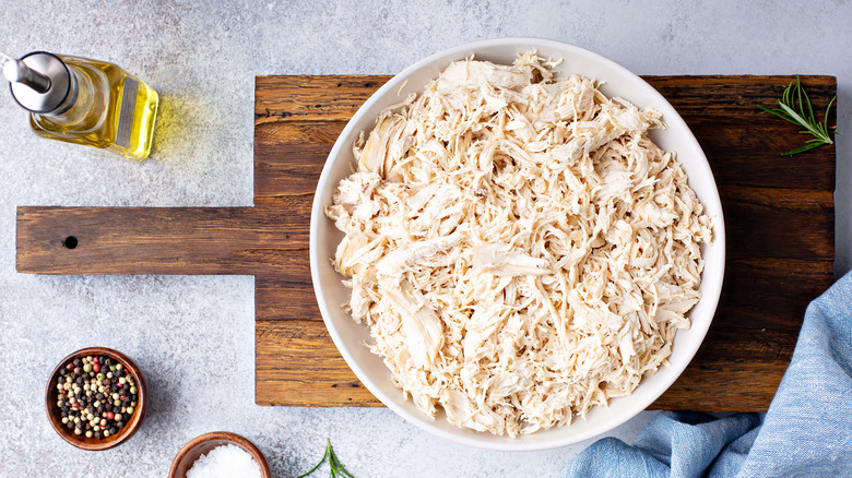 Bowl of shredded chicken meat