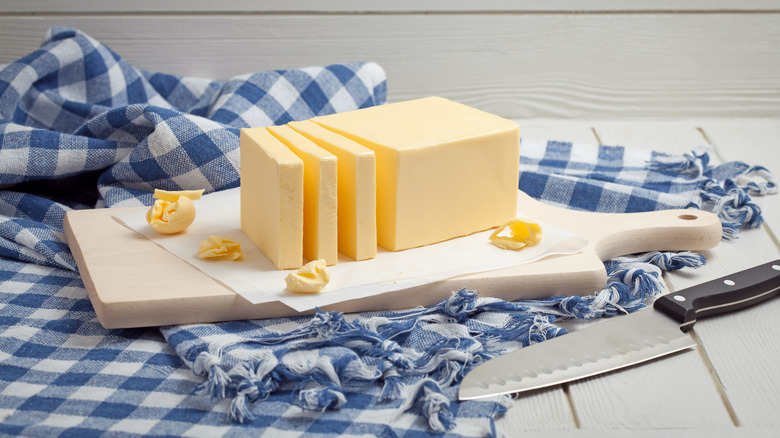 Chopped butter on a blue and white gingham napkin