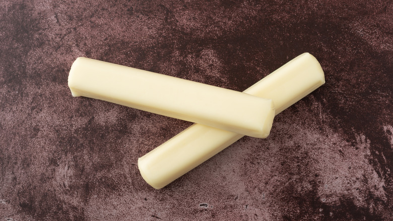 Two string cheese sticks