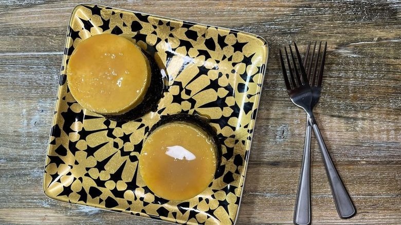 Mini chocoflans on plate next to forks