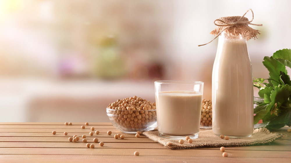 Soy milk in a cup and jug