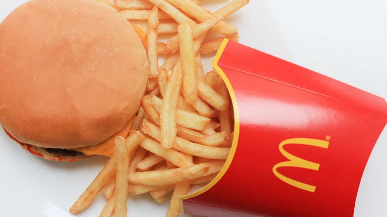 McDonald's fries spilling on burger