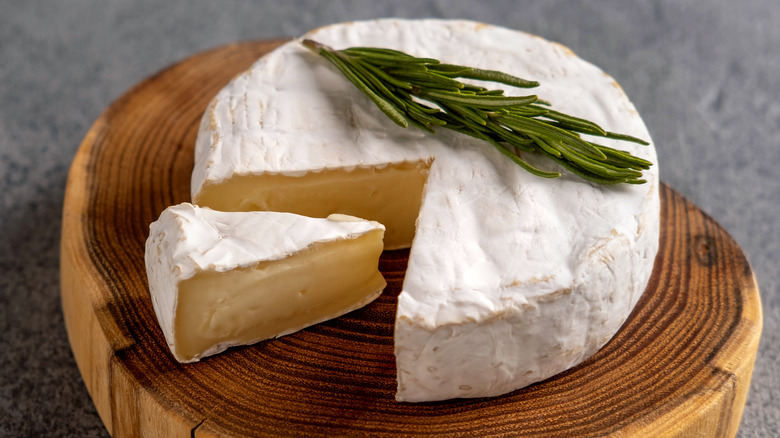 Brie on a wooden platter