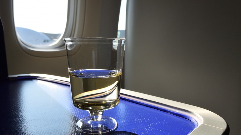 Glass of wine on a plane