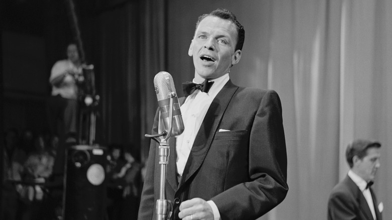 Black and white image of Frank Sinatra singing
