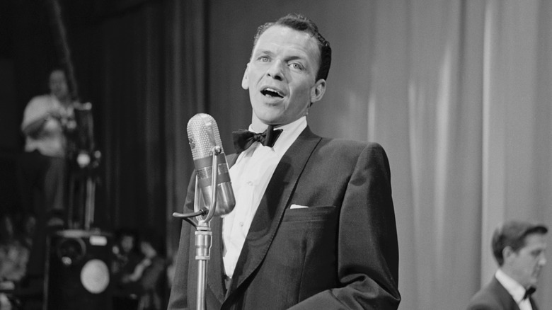Black and white image of Frank Sinatra singing