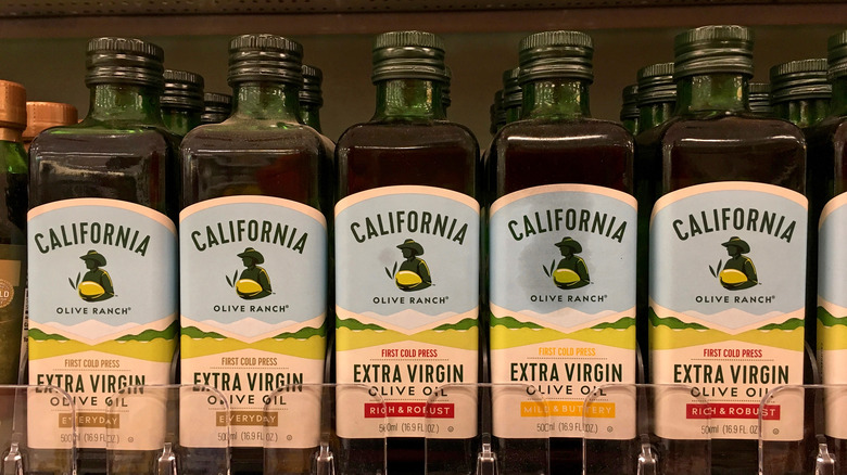 Rows of California Olive Oil on a grocery store shelf