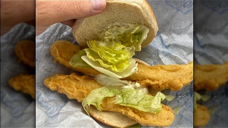 An open Giant Fish Sandwich from Captain D's.