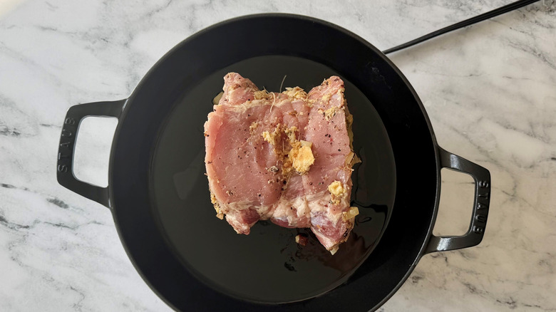 Rolled up pork loin in skillet