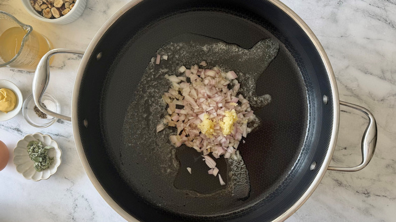 Minced garlic and shallots in skillet