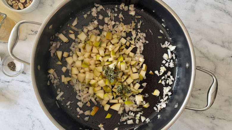 Diced pears, sage, and shallots in skillet