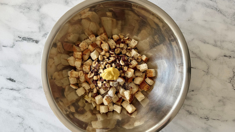 Pear and hazelnut stuffing ingredients in bowl