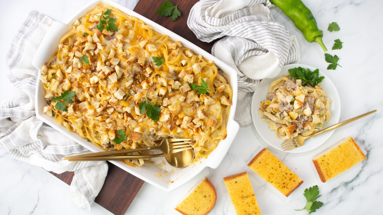 philly cheesesteak-inspired pasta in baking dish and on plate