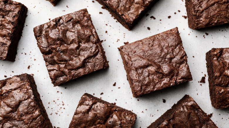 Brownies arranged on white surface