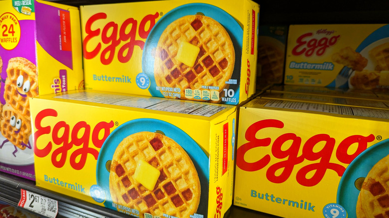Boxes of Eggo buttermilk waffles in grocery store freezer