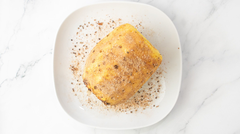 Whole pineapple coated in seasoning