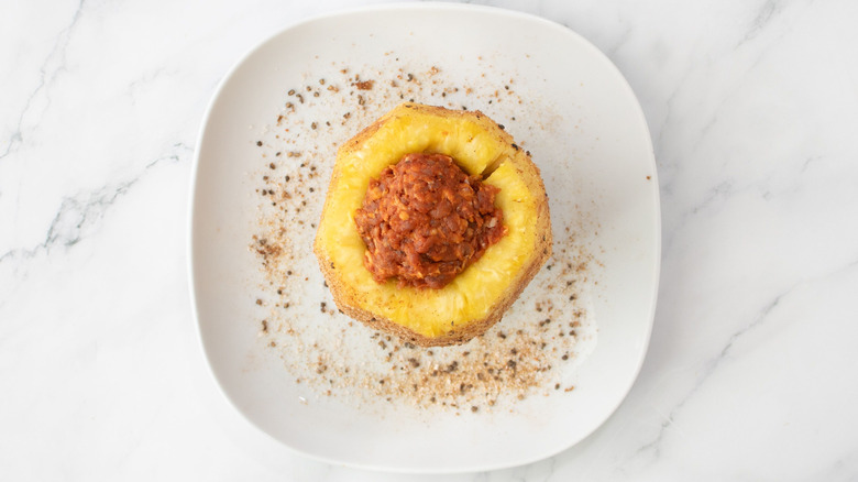Whole pineapple stuffed with chorizo