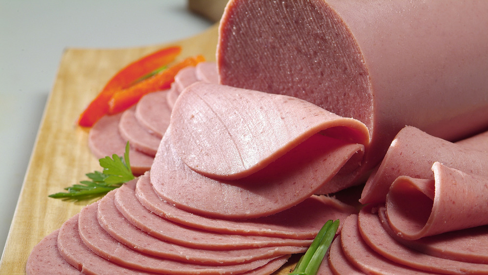 sliced bologna on a cutting board