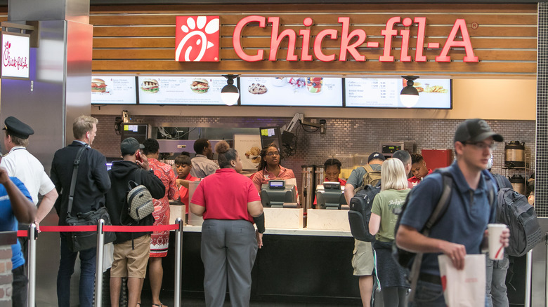 Chick-fil-A cashiers ringing orders