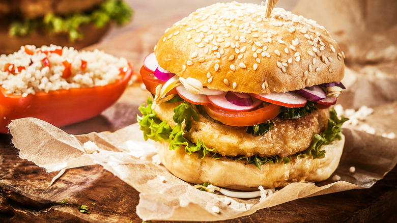 Burger with paper wrapping