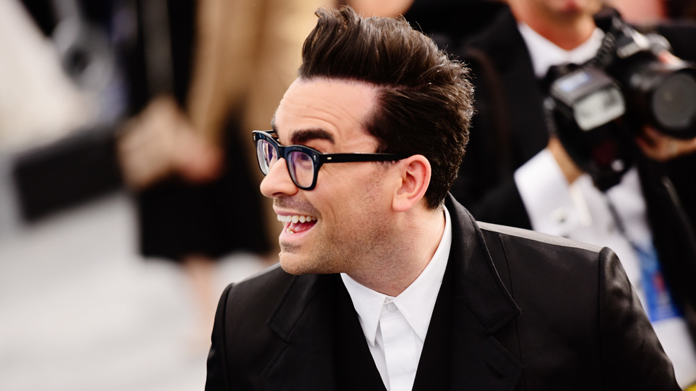 Dan Levy with goofy smile