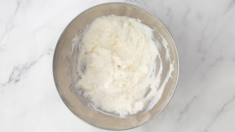 sour cream and queso in bowl