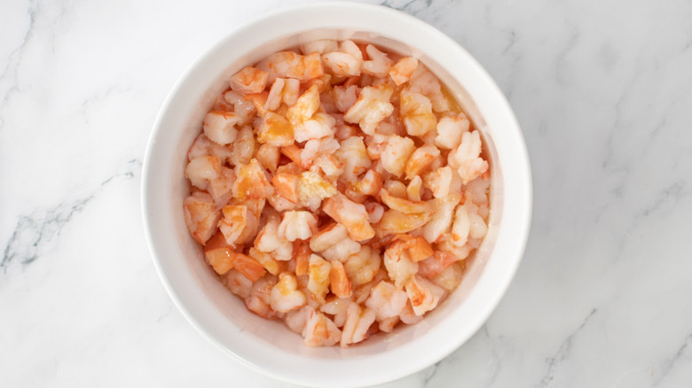 shrimp with butter seasoning in bowl