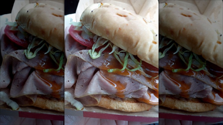 The secret menu Super Roast Beef from Arby's with lettuce and red ranch sauce.