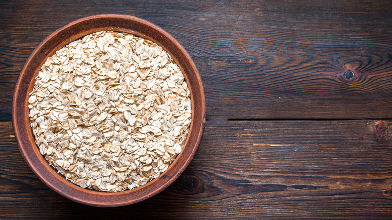 Bowl of oatmeal on wood table