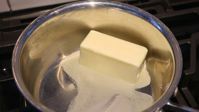 butter melting in a small metallic saucepan