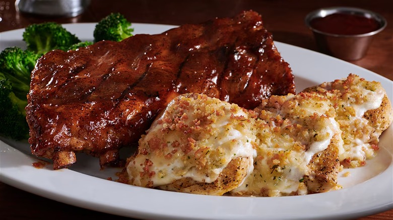 LongHorn ribs next to chicken with gooey parmesan crust
