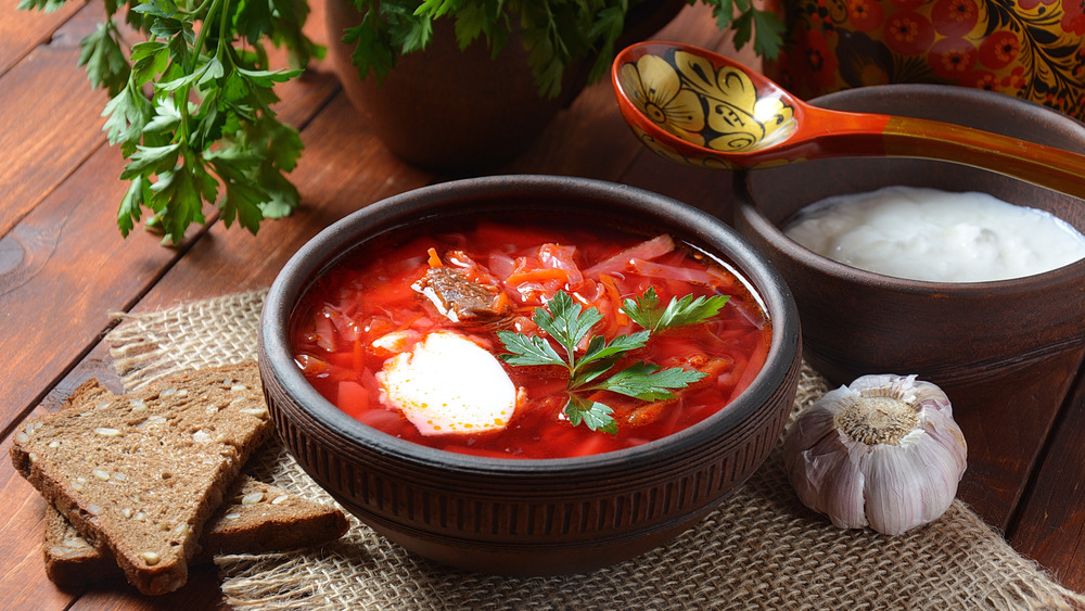 Borscht with garlic and spoon