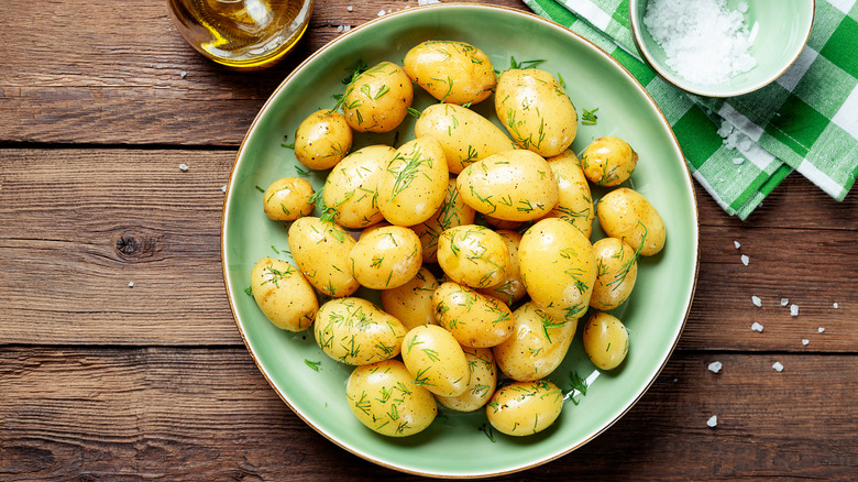 Fresh boiled potatoes with dill