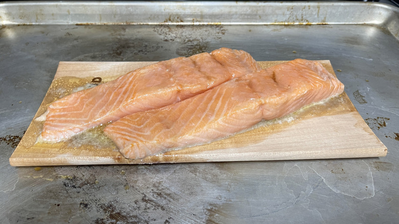glazed salmon filets on baking sheet