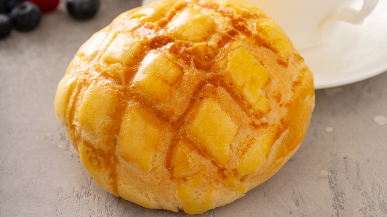 pineapple bun on a white plate