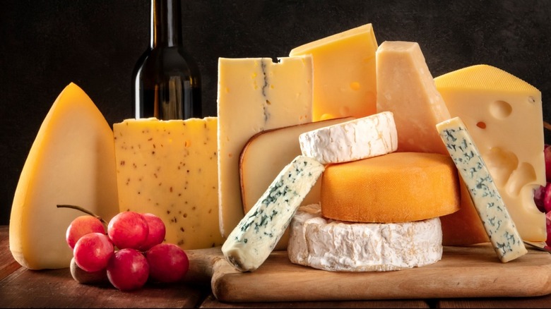 Cheeses on a wooden platter