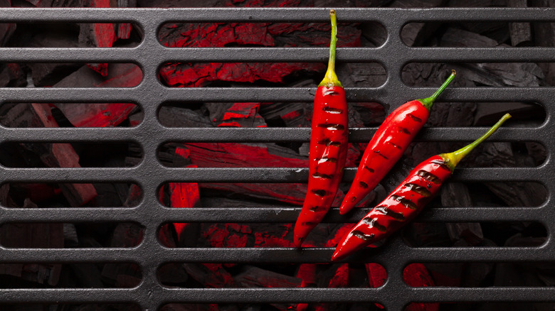 Chili peppers on a grill
