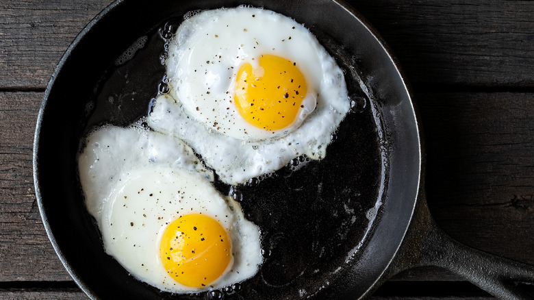 frying eggs in pan
