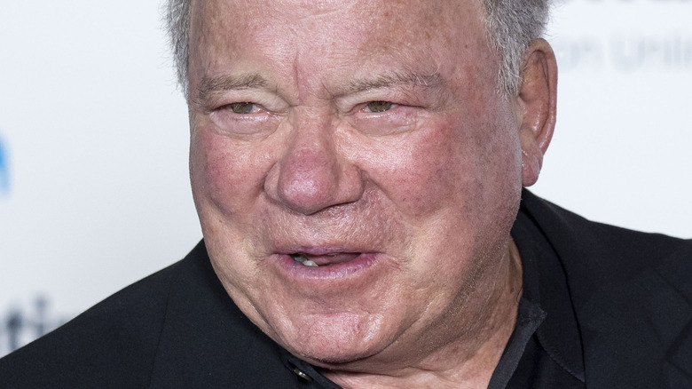 William Shatner wearing black jacket and shirt